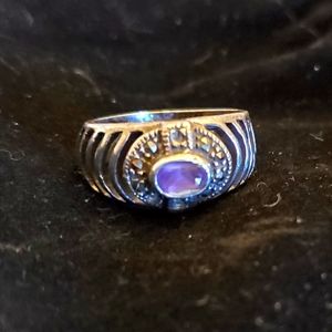 Beautiful sterling silver marcasite ring with amethyst center stone